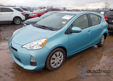 2014 Toyota Prius C One from USA, damaged, VIN JTDKDTB3XE1077580